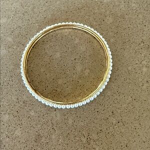 Elegant Gold Tone and White Bangle